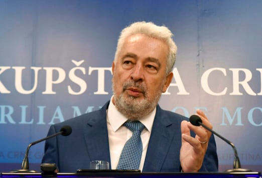 In this photo taken Wednesday, Sept. 23, 2020, leader of the opposition For the Future of Montenegro Zdravko Krivokapic speaks in parliament building in Podgorica, Montenegro. Montenegro's president has proposed an opposition leader as the Balkan countrys new prime minister, paving the way for his pro-Western partys end in power after a 30-year rule. In accordance with his presidential duties, Milo Djukanovic on Thursday, Oct. 8, 2020 proposed to parliament that opposition leader Zdravko Krivokapic be the next premier. (AP Photo/Risto Bozovic) In this photo taken Wednesday, Sept. 23, 2020, leader of the opposition For the Future of Montenegro Zdravko Krivokapic speaks in parliament building in Podgorica, Montenegro. Montenegro's president has proposed an opposition leader as the Balkan countrys new prime minister, paving the way for his pro-Western partys end in power after a 30-year rule. In accordance with his presidential duties, Milo Djukanovic on Thursday, Oct. 8, 2020 proposed to parliament that opposition leader Zdravko Krivokapic be the next premier. (AP Photo/Risto Bozovic)