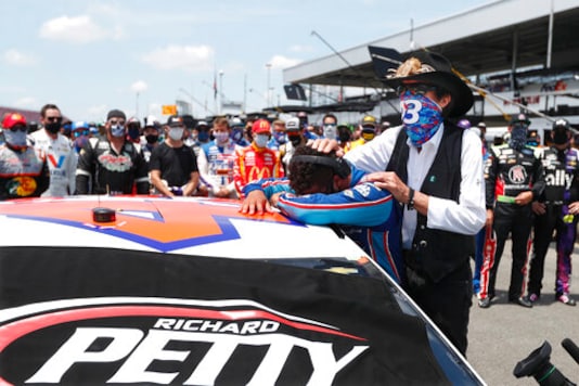 FILE - In this June 22, 2020, file photo, Driver Bubba Wallace is consoled by team owner Richard Petty prior to the start of the NASCAR Cup Series at the Talladega Superspeedway in Talladega, Ala. The Cup Series returns to Talladega on Sunday. (AP Photo/John Bazemore, File) FILE - In this June 22, 2020, file photo, Driver Bubba Wallace is consoled by team owner Richard Petty prior to the start of the NASCAR Cup Series at the Talladega Superspeedway in Talladega, Ala. The Cup Series returns to Talladega on Sunday. (AP Photo/John Bazemore, File)