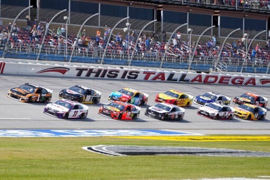 Denny Hamlin (11) and Kurt Busch (1) lead the field to the start of the YellaWood 500 NASCAR auto race at Talladega Superspeedway, Sunday, Oct. 4, 2020, in Talladega, Ala. (AP Photo/John Bazemore) Denny Hamlin (11) and Kurt Busch (1) lead the field to the start of the YellaWood 500 NASCAR auto race at Talladega Superspeedway, Sunday, Oct. 4, 2020, in Talladega, Ala. (AP Photo/John Bazemore)