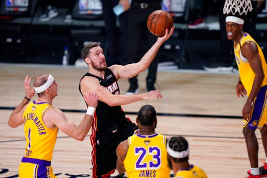 Miami Heat's Goran Dragic (7) drives to the basket against the Los Angeles Lakers during the first half of Game 1 of basketball's NBA Finals Wednesday, Sept. 30, 2020, in Lake Buena Vista, Fla. (AP Photo/Mark J. Terrill) Miami Heat's Goran Dragic (7) drives to the basket against the Los Angeles Lakers during the first half of Game 1 of basketball's NBA Finals Wednesday, Sept. 30, 2020, in Lake Buena Vista, Fla. (AP Photo/Mark J. Terrill)