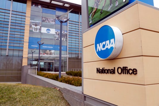 FILE - In this March 12, 2020, file photo, the national office of the NCAA in Indianapolis is shown. A set of proposals to permit NCAA athletes to earn money from endorsements and sponsorships deals will go up for vote in January, the last step for the association to change its rules but not the last word on how name, image and likeness compensation will work. (AP Photo/Michael Conroy, File) FILE - In this March 12, 2020, file photo, the national office of the NCAA in Indianapolis is shown. A set of proposals to permit NCAA athletes to earn money from endorsements and sponsorships deals will go up for vote in January, the last step for the association to change its rules but not the last word on how name, image and likeness compensation will work. (AP Photo/Michael Conroy, File)