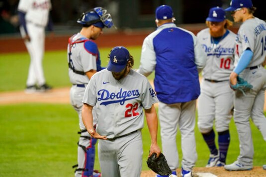 Los Angeles Dodgers starting pitcher Clayton Kershaw (22) leaves the game against the Atlanta Braves during the sixth inning in Game 4 of a baseball National League Championship Series Thursday, Oct. 15, 2020, in Arlington, Texas. (AP Photo/Eric Gay) Los Angeles Dodgers starting pitcher Clayton Kershaw (22) leaves the game against the Atlanta Braves during the sixth inning in Game 4 of a baseball National League Championship Series Thursday, Oct. 15, 2020, in Arlington, Texas. (AP Photo/Eric Gay)