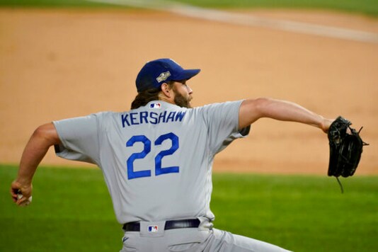 Los Angeles Dodgers starting pitcher Clayton Kershaw throws against the Atlanta Braves during the fifth inning in Game 4 of a baseball National League Championship Series Thursday, Oct. 15, 2020, in Arlington, Texas. (AP Photo/Tony Gutierrez) Los Angeles Dodgers starting pitcher Clayton Kershaw throws against the Atlanta Braves during the fifth inning in Game 4 of a baseball National League Championship Series Thursday, Oct. 15, 2020, in Arlington, Texas. (AP Photo/Tony Gutierrez)