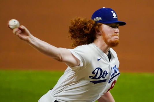 Los Angeles Dodgers relief pitcher Dustin May (85) throws against the San Diego Padres during the fifth inning in Game 1 of a baseball NL Division Series, Tuesday, Oct. 6, 2020, in Arlington, Texas. (AP Photo/Tony Gutierrez) Los Angeles Dodgers relief pitcher Dustin May (85) throws against the San Diego Padres during the fifth inning in Game 1 of a baseball NL Division Series, Tuesday, Oct. 6, 2020, in Arlington, Texas. (AP Photo/Tony Gutierrez)