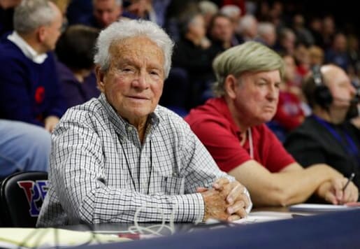 Long-time Associated Press correspondent Jack Scheuer sits courtside watching Penn take on Princeton in an NCAA college basketball game at The Palestra on Saturday, Jan. 4, 2020, in Philadelphia. Scheuer, the go-to guy at courtside, on the field and in the press box, who covered Philadelphia sports from the days of Wilt Chamberlain to Bryce Harper for The Associated Press and other outlets, died Friday, Oct. 16, 2020. He was 88. (Yong Kim/The Philadelphia Inquirer via AP) Long-time Associated Press correspondent Jack Scheuer sits courtside watching Penn take on Princeton in an NCAA college basketball game at The Palestra on Saturday, Jan. 4, 2020, in Philadelphia. Scheuer, the go-to guy at courtside, on the field and in the press box, who covered Philadelphia sports from the days of Wilt Chamberlain to Bryce Harper for The Associated Press and other outlets, died Friday, Oct. 16, 2020. He was 88. (Yong Kim/The Philadelphia Inquirer via AP)