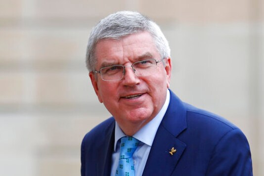 FILE - In this June 7, 2019, file photo, International Olympic Committee (IOC) President Thomas Bach arrives to meet French President Emmanuel Macron at the Elysee Palace in Paris. Bach is planning a trip to Japan November, 2020, to meet with new Prime Minister Yoshihide Suga and organizers of the postponed Tokyo Olympics, Tokyo Olympic CEO Toshiro Muto said Friday, Oct. 9. (AP Photo/Francois Mori, File)