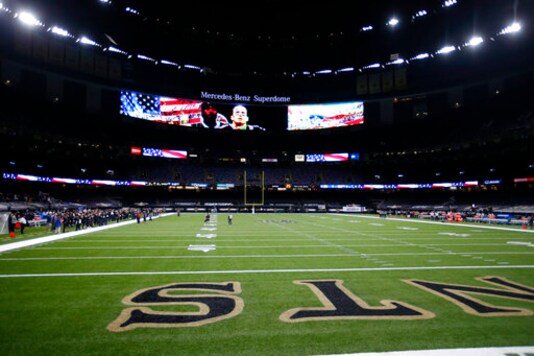 The New Orleans Saints stand for the National Anthem while the Green Bay Packers did not take to the field until after the Anthem, before an NFL football game in New Orleans, Sunday, Sept. 27, 2020. (AP Photo/Butch Dill) The New Orleans Saints stand for the National Anthem while the Green Bay Packers did not take to the field until after the Anthem, before an NFL football game in New Orleans, Sunday, Sept. 27, 2020. (AP Photo/Butch Dill)