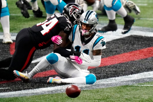 Carolina Panthers wide receiver Robby Anderson (11) misses the catch against Atlanta Falcons linebacker Foye Oluokun (54) during the first half of an NFL football game, Sunday, Oct. 11, 2020, in Atlanta. (AP Photo/Brynn Anderson)