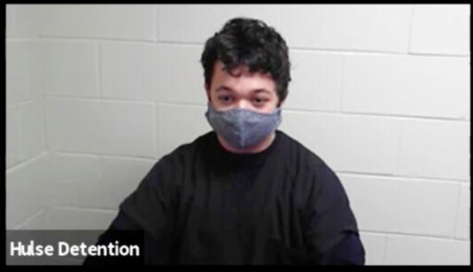 In this screen grab from live stream video, Kyle Rittenhouse appears via video during a hearing at the Nineteenth Judicial Circuit Court in Waukegan, Ill., on Friday, Oct. 9, 2020. Rittenhouse, who is accused of killing two protesters days after Jacob Blake was shot by police in Kenosha, Wis., is fighting his return to Wisconsin to face homicide charges. (Nineteenth Judicial Circuit Court via AP) In this screen grab from live stream video, Kyle Rittenhouse appears via video during a hearing at the Nineteenth Judicial Circuit Court in Waukegan, Ill., on Friday, Oct. 9, 2020. Rittenhouse, who is accused of killing two protesters days after Jacob Blake was shot by police in Kenosha, Wis., is fighting his return to Wisconsin to face homicide charges. (Nineteenth Judicial Circuit Court via AP)