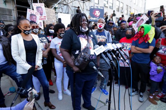 Tracy Cole, mother of Alvin Cole, talks to the media outside the Milwaukee County courthouse in Milwaukee on Wednesday, Oct. 7, 2020. Eight months after the shooting death of 17-year-old Alvin Cole in February, the Milwaukee County District Attorney's Office ruled Wednesday a Black police officer won't be charged because he had reasonable belief that deadly force was necessary. (Mike De Sisti/Milwaukee Journal-Sentinel via AP) Tracy Cole, mother of Alvin Cole, talks to the media outside the Milwaukee County courthouse in Milwaukee on Wednesday, Oct. 7, 2020. Eight months after the shooting death of 17-year-old Alvin Cole in February, the Milwaukee County District Attorney's Office ruled Wednesday a Black police officer won't be charged because he had reasonable belief that deadly force was necessary. (Mike De Sisti/Milwaukee Journal-Sentinel via AP)