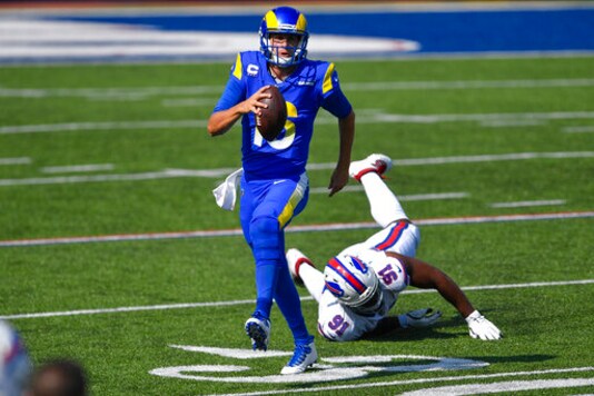 Los Angeles Rams' Jared Goff (16) evades Buffalo Bills' Ed Oliver (91) during the first half of an NFL football game Sunday, Sept. 27, 2020, in Orchard Park, N.Y. (AP Photo/Adrian Kraus) Los Angeles Rams' Jared Goff (16) evades Buffalo Bills' Ed Oliver (91) during the first half of an NFL football game Sunday, Sept. 27, 2020, in Orchard Park, N.Y. (AP Photo/Adrian Kraus)