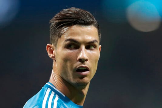 FILE - In this Sept. 18, 2019, file photo, Juventus' Cristiano Ronaldo looks back during the Champions League Group D soccer match in Madrid, Spain. Ronaldo's legal fight with a woman who accuses the international soccer star of raping her in his suite at a Las Vegas resort more than 10 years ago is heading toward a court hearing before a federal judge in Las Vegas. (AP Photo/Bernat Armangue, File) FILE - In this Sept. 18, 2019, file photo, Juventus' Cristiano Ronaldo looks back during the Champions League Group D soccer match in Madrid, Spain. Ronaldo's legal fight with a woman who accuses the international soccer star of raping her in his suite at a Las Vegas resort more than 10 years ago is heading toward a court hearing before a federal judge in Las Vegas. (AP Photo/Bernat Armangue, File)