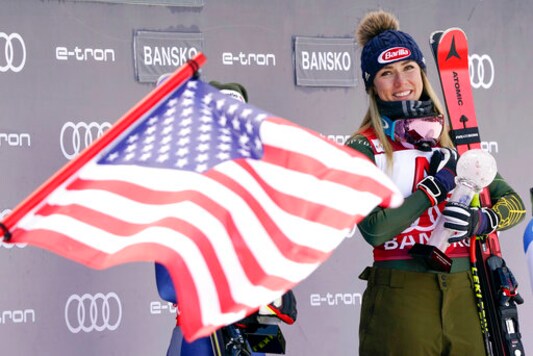 FILE - In this Sunday, Jan. 26, 2020 file photo, United States' Mikaela Shiffrin smiles on the podium after winning the alpine ski, women's World Cup super-G, in Bansko, Bulgaria. A year that turned Mikaela Shiffrins world upside-down has left the American standout wondering how much time she has left in ski racing. The double Olympic and three-time overall World Cup champion is questioning how long all the traveling will still be worth it.  (AP Photo/Giovanni Auletta, File)