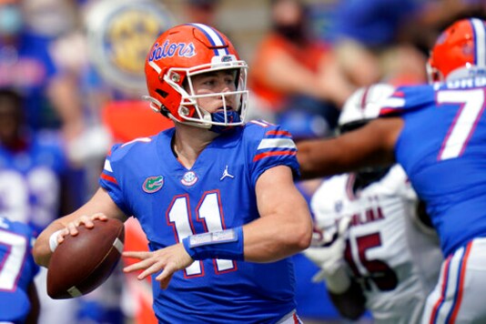 Florida quarterback Kyle Trask (11) throws a pass against South Carolina during the first half of an NCAA college football game, Saturday, Oct. 3, 2020, in Gainesville, Fla. (AP Photo/John Raoux,Pool)