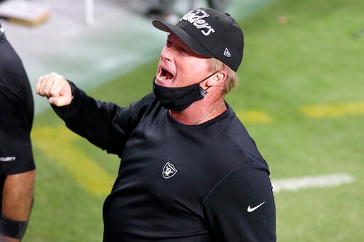 Las Vegas Raiders head coach Jon Gruden celebrates after defeating the New Orleans Saints in an NFL football game, Monday, Sept. 21, 2020, in Las Vegas. (AP Photo/Isaac Brekken)