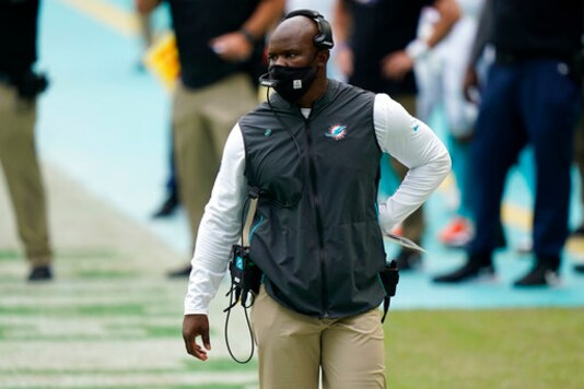 Miami Dolphins head coach Brian Flores walks the sidelines during the first half of an NFL football game against the Seattle Seahawks, Sunday, Oct. 4, 2020, in Miami Gardens, Fla. (AP Photo/Lynne Sladky) Miami Dolphins head coach Brian Flores walks the sidelines during the first half of an NFL football game against the Seattle Seahawks, Sunday, Oct. 4, 2020, in Miami Gardens, Fla. (AP Photo/Lynne Sladky)