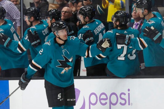 FILE - In this Nov. 5, 2019, file photo, San Jose Sharks center Patrick Marleau, foreground, is congratulated by teammates after he scored against the Chicago Blackhawks during the second period of an NHL hockey game in San Jose, Calif. Marleau rejoined San Jose on Tuesday, Oct. 13, 2020, signing a one-year deal worth the league minimum of $700,000. (AP Photo/Jeff Chiu, File) FILE - In this Nov. 5, 2019, file photo, San Jose Sharks center Patrick Marleau, foreground, is congratulated by teammates after he scored against the Chicago Blackhawks during the second period of an NHL hockey game in San Jose, Calif. Marleau rejoined San Jose on Tuesday, Oct. 13, 2020, signing a one-year deal worth the league minimum of $700,000. (AP Photo/Jeff Chiu, File)