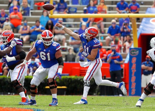 Florida quarterback Kyle Trask (11) throws a pass against South Carolina during an NCAA college football game in Gainesville, Fla., Saturday, Oct. 3, 2020. (Brad McClenny/The Gainesville Sun via AP, Pool) Florida quarterback Kyle Trask (11) throws a pass against South Carolina during an NCAA college football game in Gainesville, Fla., Saturday, Oct. 3, 2020. (Brad McClenny/The Gainesville Sun via AP, Pool)
