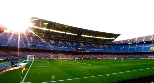 Real Madrid and Barcelona players run for the ball during the Spanish La Liga soccer match between FC Barcelona and Real Madrid at the Camp Nou stadium in Barcelona, Spain, Saturday, Oct. 24, 2020. (AP Photo/Joan Monfort)