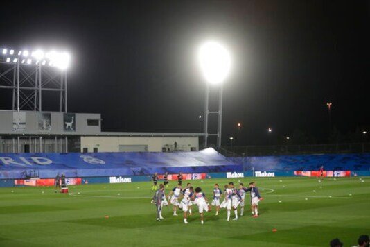 Real Madrid's players warm up prior to the Spanish La Liga soccer match between Real Madrid and Valladolid at Alfredo di Stefano stadium in Madrid, Spain, Wednesday, Sept. 30, 2020. (AP Photo/Manu Fernandez)