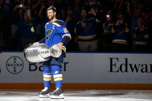 FILE - In this Oct. 2, 2019, file photo, St. Louis Blues captain Alex Pietrangelo lifts the Stanley Cup during a ceremony honoring the Blues championship victory before the start of an NHL hockey game against the Washington Capitals in St. Louis. The past few weeks have seen several recent Stanley Cup winners get rid of members of their championship core. The Chicago Blackhawks moved on from Corey Crawford, the Washington Capitals did the same with Braden Holtby, the Pittsburgh Penguins traded fellow goalie Matt Murray and forward Patric Hornqvist and the St. Louis Blues signing Torey Krug means captain Alex Pietrangelo will sign elsewhere. (AP Photo/Jeff Roberson, File) FILE - In this Oct. 2, 2019, file photo, St. Louis Blues captain Alex Pietrangelo lifts the Stanley Cup during a ceremony honoring the Blues championship victory before the start of an NHL hockey game against the Washington Capitals in St. Louis. The past few weeks have seen several recent Stanley Cup winners get rid of members of their championship core. The Chicago Blackhawks moved on from Corey Crawford, the Washington Capitals did the same with Braden Holtby, the Pittsburgh Penguins traded fellow goalie Matt Murray and forward Patric Hornqvist and the St. Louis Blues signing Torey Krug means captain Alex Pietrangelo will sign elsewhere. (AP Photo/Jeff Roberson, File)