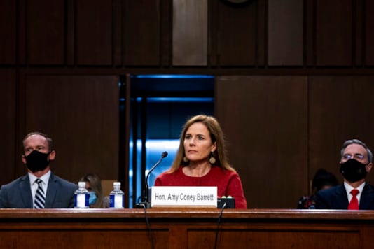 Supreme Court nominee Amy Coney Barrett listens during a confirmation hearing before the Senate Judiciary Committee, Tuesday, Oct. 13, 2020, on Capitol Hill in Washington. (Anna Moneymaker/The New York Times via AP, Pool) Supreme Court nominee Amy Coney Barrett listens during a confirmation hearing before the Senate Judiciary Committee, Tuesday, Oct. 13, 2020, on Capitol Hill in Washington. (Anna Moneymaker/The New York Times via AP, Pool)