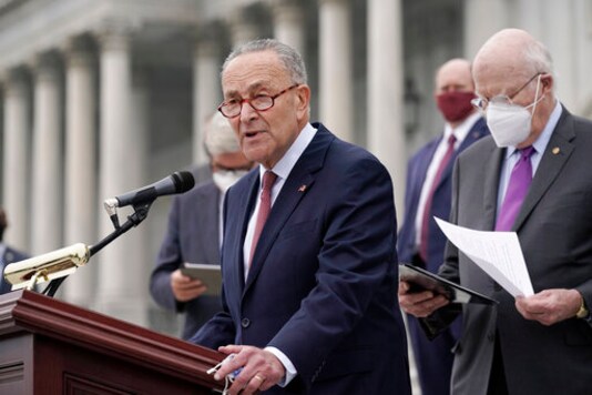 Senate Minority Leader Chuck Schumer, D-N.Y., and Democratic members of the Senate Judiciary Committee hold a news conference after boycotting the vote by the Republican-led panel to advance the nomination of Judge Amy Coney Barrett to sit on the Supreme Court, Thursday, Oct. 22, 2020, at the Capitol in Washington. (AP Photo/J. Scott Applewhite) Senate Minority Leader Chuck Schumer, D-N.Y., and Democratic members of the Senate Judiciary Committee hold a news conference after boycotting the vote by the Republican-led panel to advance the nomination of Judge Amy Coney Barrett to sit on the Supreme Court, Thursday, Oct. 22, 2020, at the Capitol in Washington. (AP Photo/J. Scott Applewhite)