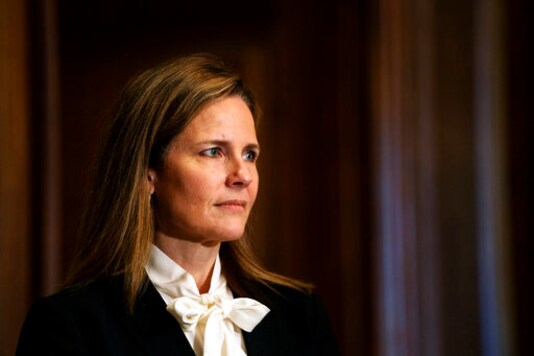 FILE - Judge Amy Coney Barrett, President Donald Trumps nominee for the U.S. Supreme Court, meets with Sen. Josh Hawley, R-Mo., on Capitol Hill in Washington, Thursday, Oct. 1, 2020. Barrett graduated with honors in 1994 from a small liberal arts school, Rhodes College in Memphis. Many alumni have posted a letter on social media expressing their opposition to Barrett's nomination to replace Justice Ruth Bader Ginsburg on the U.S. Supreme Court after Ginsburg's death last month.(Demetrius Freeman/The Washington Post via AP, Pool) FILE - Judge Amy Coney Barrett, President Donald Trumps nominee for the U.S. Supreme Court, meets with Sen. Josh Hawley, R-Mo., on Capitol Hill in Washington, Thursday, Oct. 1, 2020. Barrett graduated with honors in 1994 from a small liberal arts school, Rhodes College in Memphis. Many alumni have posted a letter on social media expressing their opposition to Barrett's nomination to replace Justice Ruth Bader Ginsburg on the U.S. Supreme Court after Ginsburg's death last month.(Demetrius Freeman/The Washington Post via AP, Pool)