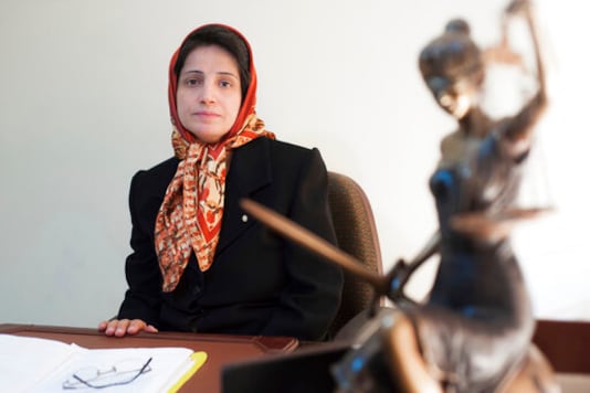 FILE - In this Nov. 1, 2008 file photo, Iranian human rights lawyer Nasrin Sotoudeh, poses for a photograph in her office in Tehran, Iran. The imprisoned Iranian human rights lawyer Nasrin Sotoudeh and the prominent Belarus opposition figure Ales Bialiatski have been awarded the 2020 Swedish Right Livelihood Award, sometimes referred to as the Alternative Nobel, along with activists from Nicaragua and the United States. (AP Photo/Arash Ashourinia, File)