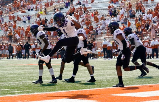 TCU cornerback Tre'Vius Hodges-Tomlinson (1) celebrates with teammates after TCU recovered a Texas fumble during the second half of an NCAA college football game, Saturday, Oct. 3, 2020, in Austin, Texas. (AP Photo/Eric Gay) TCU cornerback Tre'Vius Hodges-Tomlinson (1) celebrates with teammates after TCU recovered a Texas fumble during the second half of an NCAA college football game, Saturday, Oct. 3, 2020, in Austin, Texas. (AP Photo/Eric Gay)