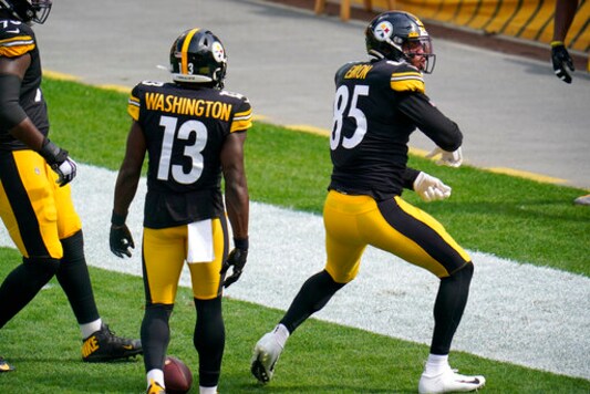 Pittsburgh Steelers tight end Eric Ebron (85) celebrates his touchdown catch during the first half of an NFL football game against the Houston Texans in Pittsburgh, Sunday, Sept. 27, 2020. (AP Photo/Gene J. Puskar) Pittsburgh Steelers tight end Eric Ebron (85) celebrates his touchdown catch during the first half of an NFL football game against the Houston Texans in Pittsburgh, Sunday, Sept. 27, 2020. (AP Photo/Gene J. Puskar)