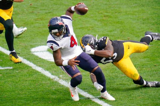Houston Texans quarterback Deshaun Watson (4) tries to get past Pittsburgh Steelers inside linebacker Devin Bush (55) on a scramble during the first half of an NFL football game, Sunday, Sept. 27, 2020, in Pittsburgh. (AP Photo/Gene J. Puskar) Houston Texans quarterback Deshaun Watson (4) tries to get past Pittsburgh Steelers inside linebacker Devin Bush (55) on a scramble during the first half of an NFL football game, Sunday, Sept. 27, 2020, in Pittsburgh. (AP Photo/Gene J. Puskar)