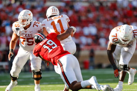 Texas Tech defensive lineman Tyree Wilson sacks quarterback Sam Ehlinger during the second half of an NCAA college football game against Texas Tech, Saturday Sept. 26, 2020, in Lubbock, Texas. (AP Photo/Mark Rogers)
