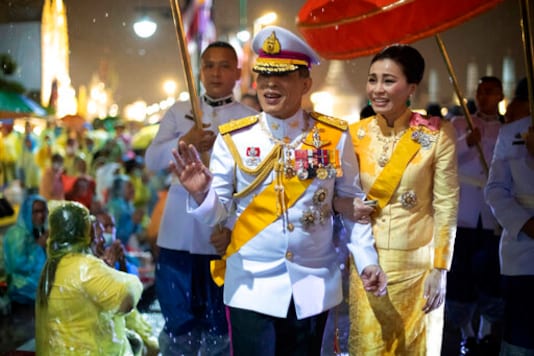 Thailand's King Maha Vajiralongkorn and Queen Suthida leave from Grand Palace after ceremony marking the fourth anniversary of the death of late Thai King Bhumibol Adulyadej, Bangkok, Thailand, Tuesday, Oct. 13, 2020. (AP Photo/Wason Wanichakorn) Thailand's King Maha Vajiralongkorn and Queen Suthida leave from Grand Palace after ceremony marking the fourth anniversary of the death of late Thai King Bhumibol Adulyadej, Bangkok, Thailand, Tuesday, Oct. 13, 2020. (AP Photo/Wason Wanichakorn)