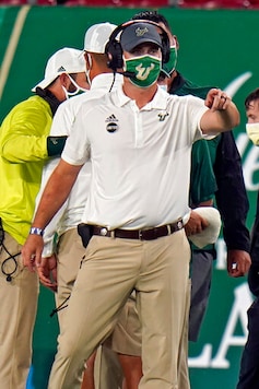 New South Florida head coach Jeff Scott shouts out intstructions to his team during the first half of an NCAA college football game against Citadel Saturday, Sept. 12, 2020, in Tampa, Fla. (AP Photo/Chris O'Meara) New South Florida head coach Jeff Scott shouts out intstructions to his team during the first half of an NCAA college football game against Citadel Saturday, Sept. 12, 2020, in Tampa, Fla. (AP Photo/Chris O'Meara)