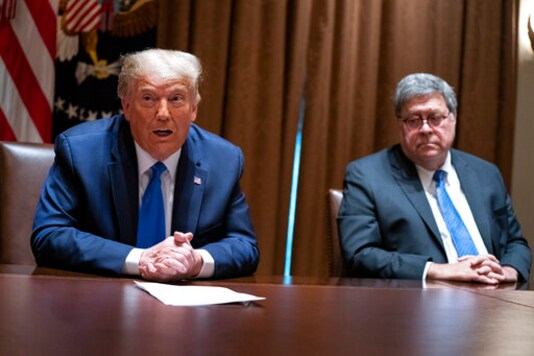 FILE - In this Sept. 23, 2020, file photo Attorney General William Barr listens as President Donald Trump speaks during a meeting with Republican state attorneys general in the Cabinet Room of the White House in Washington. The relationship between President Donald Trump and top ally Attorney General William Barr is fraying over the lack of splashy indictments so far in the Justice Departments investigation into the origins of the Russia probe, according to people familiar with the matter. (AP Photo/Evan Vucci, File) FILE - In this Sept. 23, 2020, file photo Attorney General William Barr listens as President Donald Trump speaks during a meeting with Republican state attorneys general in the Cabinet Room of the White House in Washington. The relationship between President Donald Trump and top ally Attorney General William Barr is fraying over the lack of splashy indictments so far in the Justice Departments investigation into the origins of the Russia probe, according to people familiar with the matter. (AP Photo/Evan Vucci, File)