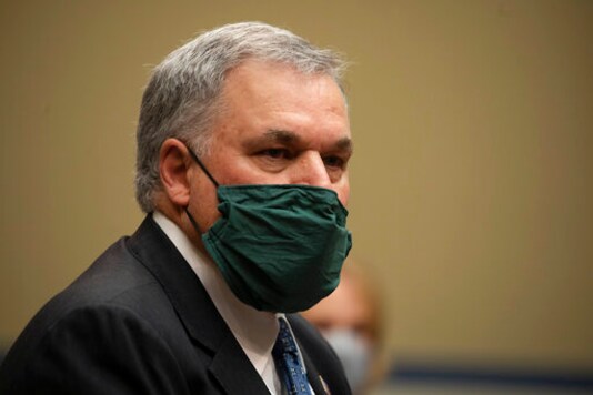 Internal Revenue Service Commissioner Charles Rettig prepares to testify before a House Committee on Oversight and Reform hearing on Wednesday, Oct. 7, 2020, in Washington. (Tasos Katopodis/Pool via AP) Internal Revenue Service Commissioner Charles Rettig prepares to testify before a House Committee on Oversight and Reform hearing on Wednesday, Oct. 7, 2020, in Washington. (Tasos Katopodis/Pool via AP)