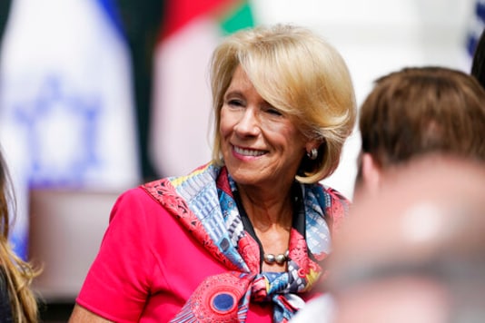 Education Secretary Betsy DeVos arrives on the South Lawn for a ceremony for the signing of the Abraham Accords, Tuesday, Sept. 15, 2020, at the White House in Washington. (AP Photo/Alex Brandon) Education Secretary Betsy DeVos arrives on the South Lawn for a ceremony for the signing of the Abraham Accords, Tuesday, Sept. 15, 2020, at the White House in Washington. (AP Photo/Alex Brandon)