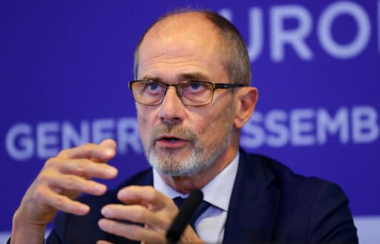 FILE - In this Friday, Oct. 18, 2019 file photo, President of the European Leagues Lars-Christer Olsson, speaks during the European Leagues General Assembly press conference in London. Veteran soccer official Lars-Christer Olsson announced Friday Oct. 9, 2020 that he is stepping down in March including as a member of UEFAs executive committee. Olsson is chairman of the 29-nation European Leagues group and has helped resist moves by top clubs to limit entry paths to the Champions League in 2024. (AP Photo/Kirsty Wigglesworth, File) FILE - In this Friday, Oct. 18, 2019 file photo, President of the European Leagues Lars-Christer Olsson, speaks during the European Leagues General Assembly press conference in London. Veteran soccer official Lars-Christer Olsson announced Friday Oct. 9, 2020 that he is stepping down in March including as a member of UEFAs executive committee. Olsson is chairman of the 29-nation European Leagues group and has helped resist moves by top clubs to limit entry paths to the Champions League in 2024. (AP Photo/Kirsty Wigglesworth, File)