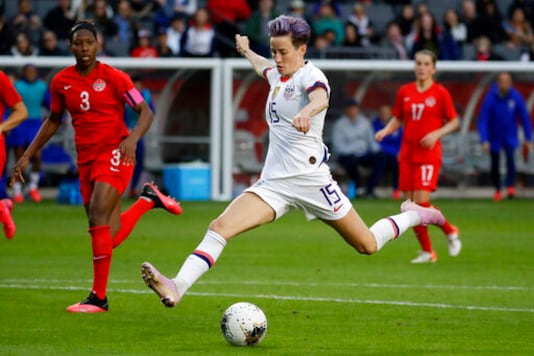 FILE - In this Feb. 9, 2020, file photo, U.S. forward Megan Rapinoe scores against Canada during the second half of a CONCACAF women's Olympic qualifying soccer match in Carson, Calif. Rapinoe is among the athletes touting the benefits of CBD for pain management and recovery. CBD products have become big business after the 2018 Farm Bill made hemp a legal agricultural crop. CBD is found in both hemp and marijuana plants. It has been hailed as a health and wellness aid and infused in everything from gummies to lotions. Rapinoe's twin sister Rachael has helped launch a CBD products company called Mendi, which is geared toward athletes. (AP Photo/Chris Carlson, File)