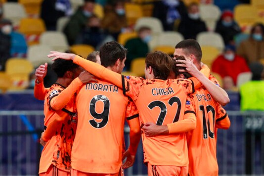 Juventus' Alvaro Morata, center left, celebrates after scoring his side's second goal during the Champions League, group G, soccer match between Dynamo Kyiv and Juventus at the Olimpiyskiy Stadium in Kyiv, Ukraine, Tuesday, Oct. 20, 2020. (Valentyn Ogirenko/Pool via AP) Juventus' Alvaro Morata, center left, celebrates after scoring his side's second goal during the Champions League, group G, soccer match between Dynamo Kyiv and Juventus at the Olimpiyskiy Stadium in Kyiv, Ukraine, Tuesday, Oct. 20, 2020. (Valentyn Ogirenko/Pool via AP)