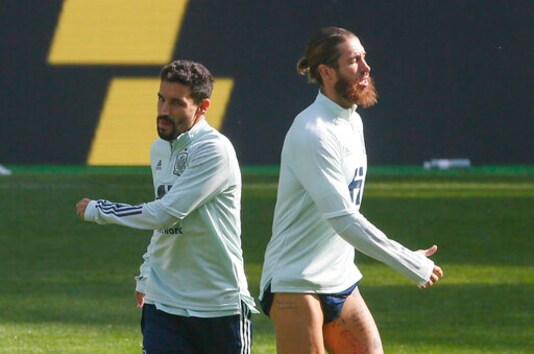 Spain's Sergio Ramos, right, and Jesus Navas warm up during a training session at the Olimpiyskiy Stadium in Kyiv, Ukraine, Monday, Oct. 12, 2020. Ukraine will play a UEFA Nations League soccer match against Spain on Tuesday. (AP Photo/Efrem Lukatsky)