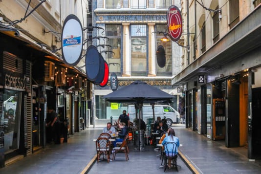 Outdoor diners are seen at a popular laneway cafe precinct in Melbourne, Australia, Wednesday, Oct. 28, 2020. Australias second largest city of Melbourne which was a coronavirus hotspot emerges from a nearly four-months lockdown, with restaurants, cafes and bars opening and outdoor contact sports resuming on Wednesday. (AP Photo/Asanka Brendon Ratnayake) Outdoor diners are seen at a popular laneway cafe precinct in Melbourne, Australia, Wednesday, Oct. 28, 2020. Australias second largest city of Melbourne which was a coronavirus hotspot emerges from a nearly four-months lockdown, with restaurants, cafes and bars opening and outdoor contact sports resuming on Wednesday. (AP Photo/Asanka Brendon Ratnayake)