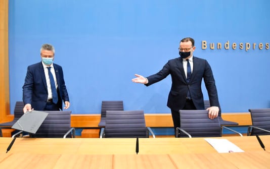 German Health Minister Jens Spahn, right, and the president of the Germany's Robert Koch Institute (RKI), Lothar Wieler, left, arrive for a press conference in Berlin, Germany, Thursday, Oct. 8, 2020 about the current developments of the new coronavirus outbreak in Germany. (Tobias Schwarz/Pool Photo via AP) German Health Minister Jens Spahn, right, and the president of the Germany's Robert Koch Institute (RKI), Lothar Wieler, left, arrive for a press conference in Berlin, Germany, Thursday, Oct. 8, 2020 about the current developments of the new coronavirus outbreak in Germany. (Tobias Schwarz/Pool Photo via AP)