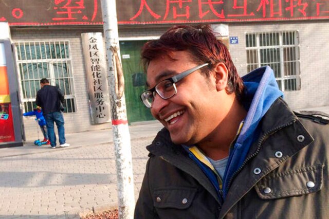 In this Dec. 23, 2014, photo Joginder Chaudhary smiles after completing a clinical class at Ningxia Medical University in Yinchuan, China. After the virus killed the 27-year-old Chaudhary in late July 2020, his mother wept inconsolably. With her son gone, Premlata Chaudhary said, how could she go on living? Three weeks later, on Aug. 18, the virus took her life, too  yet another number in an unrelenting march toward a woeful milestone. (Courtesy of Aravind Kumar via AP)