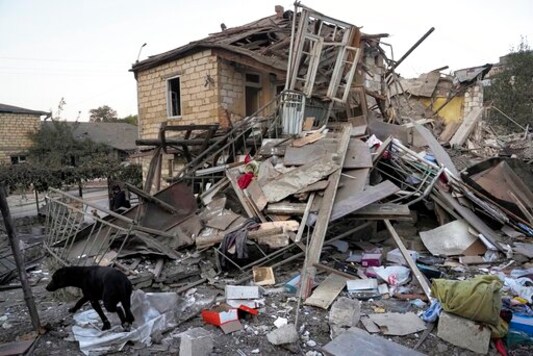 A general view of a destroyed after shelling by Azerbaijan's artillery house during a military conflict in Stepanakert, the separatist region of Nagorno-Karabakh, Saturday, Oct. 17, 2020.Nagorno-Karabakh, which lies within Azerbaijan but has been under the control of ethnic Armenian forces since a war there ended in 1994, faces an outbreak of the coronavirus amid the largest outbreak of hostilities in more than a quarter-century. (AP Photo) A general view of a destroyed after shelling by Azerbaijan's artillery house during a military conflict in Stepanakert, the separatist region of Nagorno-Karabakh, Saturday, Oct. 17, 2020.Nagorno-Karabakh, which lies within Azerbaijan but has been under the control of ethnic Armenian forces since a war there ended in 1994, faces an outbreak of the coronavirus amid the largest outbreak of hostilities in more than a quarter-century. (AP Photo)