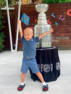 Kameron Bush, 3, poses with the Stanley Cup at the Childrens Cancer Center in Tampa, Fla., on Oct. 16, 2020. The Tampa Bay Lightning took the Stanley Cup to the Childrens Cancer Center as part of their local tour of stops after winning the National Hockey Leagues championship trophy Sept. 28 in Edmonton, Alberta. (Kristina Hjertkvist/Tampa Bay Lightning via AP) Kameron Bush, 3, poses with the Stanley Cup at the Childrens Cancer Center in Tampa, Fla., on Oct. 16, 2020. The Tampa Bay Lightning took the Stanley Cup to the Childrens Cancer Center as part of their local tour of stops after winning the National Hockey Leagues championship trophy Sept. 28 in Edmonton, Alberta. (Kristina Hjertkvist/Tampa Bay Lightning via AP)