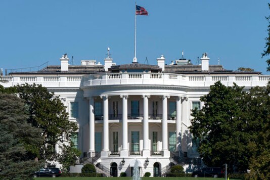 The White House and South Lawn on Thursday, Oct. 8, 2020, in Washington. (AP Photo/Jacquelyn Martin) The White House and South Lawn on Thursday, Oct. 8, 2020, in Washington. (AP Photo/Jacquelyn Martin)