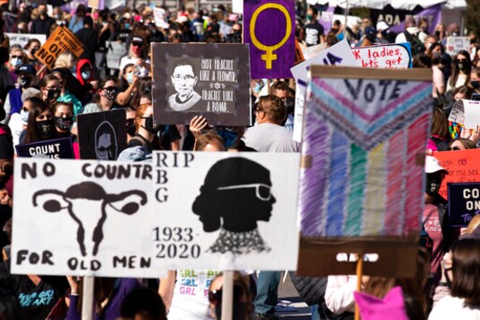 Demonstrators rally during the Women's March at Freedom Plaza, Saturday, Oct. 17, 2020, in Washington. (AP Photo/Jose Luis Magana) Demonstrators rally during the Women's March at Freedom Plaza, Saturday, Oct. 17, 2020, in Washington. (AP Photo/Jose Luis Magana)
