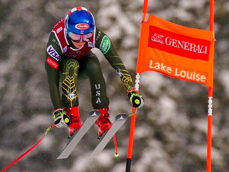 FILE - In this Dec. 7, 2019, file photo, Mikaela Shiffrin races down the course during the women's World Cup downhill ski race, in Lake Louise, Alberta. The governing body for ski racing announced it will skip the traditional World Cup swing through North America to remain in Europe due to the COVID-19 pandemic. The womens side will miss stops in Killington, Vermont, and Lake Louise, Alberta. The mens tour wont race in Beaver Creek, Colorado, or make a separate trip to Lake Louise. The venues are slated to be back on the calendar in 2021-22, according to the International Ski Federation. (Frank Gunn/The Canadian Press via AP, File)